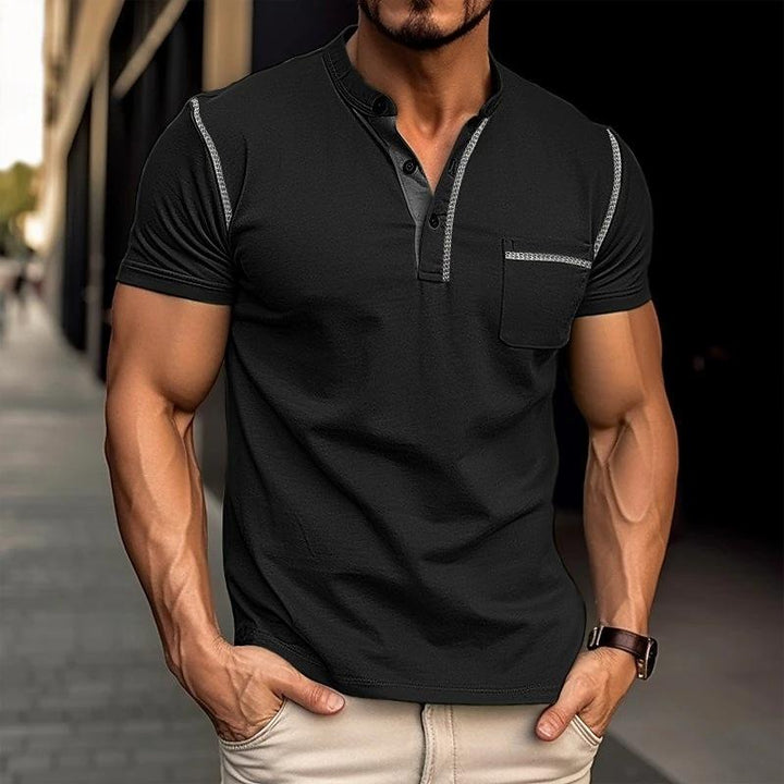 Men's black Henley shirt with pocket, short sleeves, and contrast trim detail