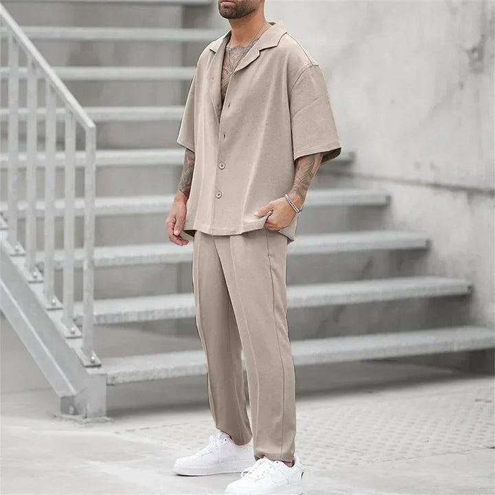 Men's beige short sleeve shirt and pants set with button front top and straight leg pants