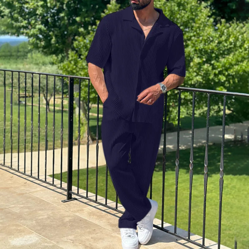 Navy pleated camp collar two piece set with short sleeve shirt and matching trousers