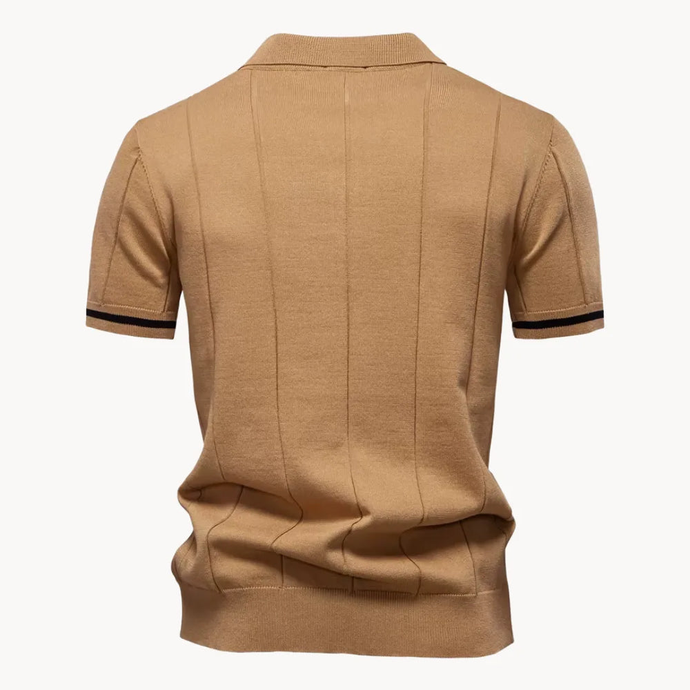 Back view of tan short sleeve knit polo shirt with vertical ribbed texture and straight hem