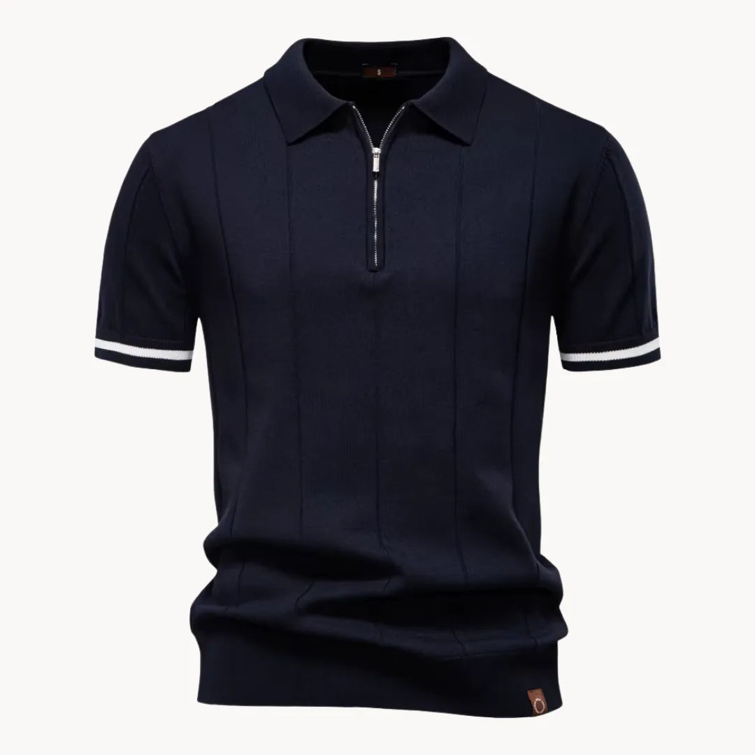 Navy blue short sleeve knit polo shirt with zip collar and white striped sleeve cuffs
