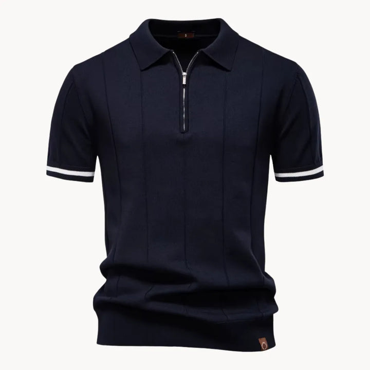 Navy blue short sleeve knit polo shirt with zip collar and white striped sleeve cuffs