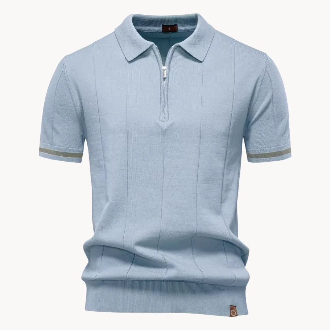 Light blue knit polo shirt with short sleeves, zip collar, and gray striped cuff trim
