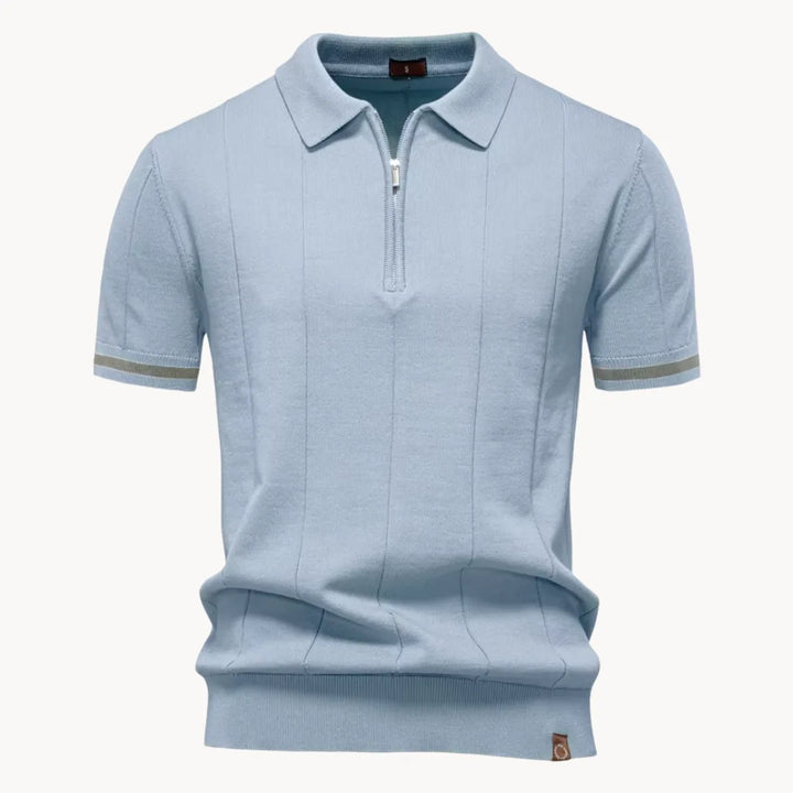 Light blue knit polo shirt with short sleeves, zip collar, and gray striped cuff trim