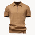 Tan knit polo shirt with short sleeves, zip placket, and black striped sleeve cuffs