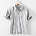 Light gray men's casual short sleeve linen shirt with polo collar and button placket