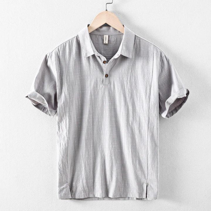 Light gray men's casual short sleeve linen shirt with polo collar and button placket
