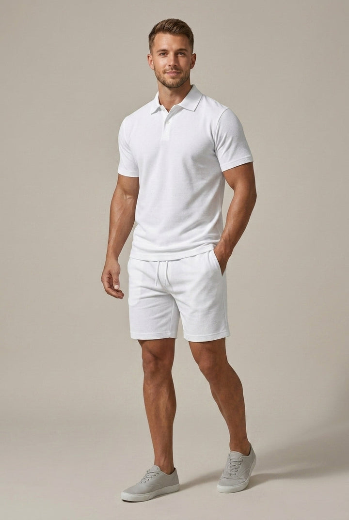 White short sleeve polo shirt and matching white shorts set with drawstring waist, clean men's casual set