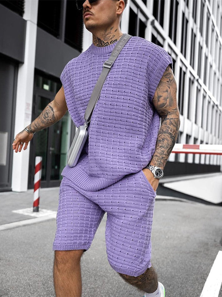 Purple sleeveless knit shorts set with textured shirt and matching shorts on a man