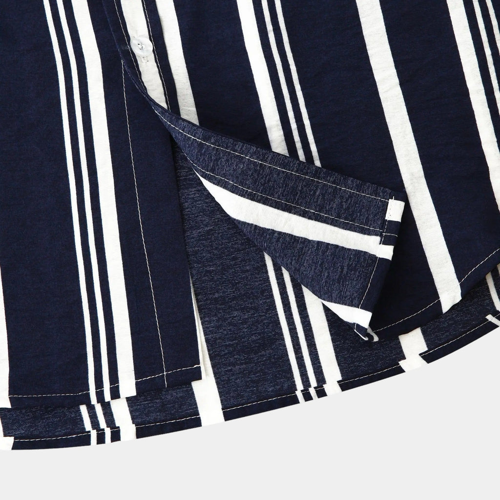 Close-up of navy striped button up shirt showing collar, placket, and short sleeve cuff