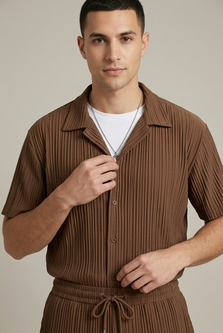 Close-up of brown striped short sleeve shirt with button front and drawstring pants, casual men's shirt pants set
