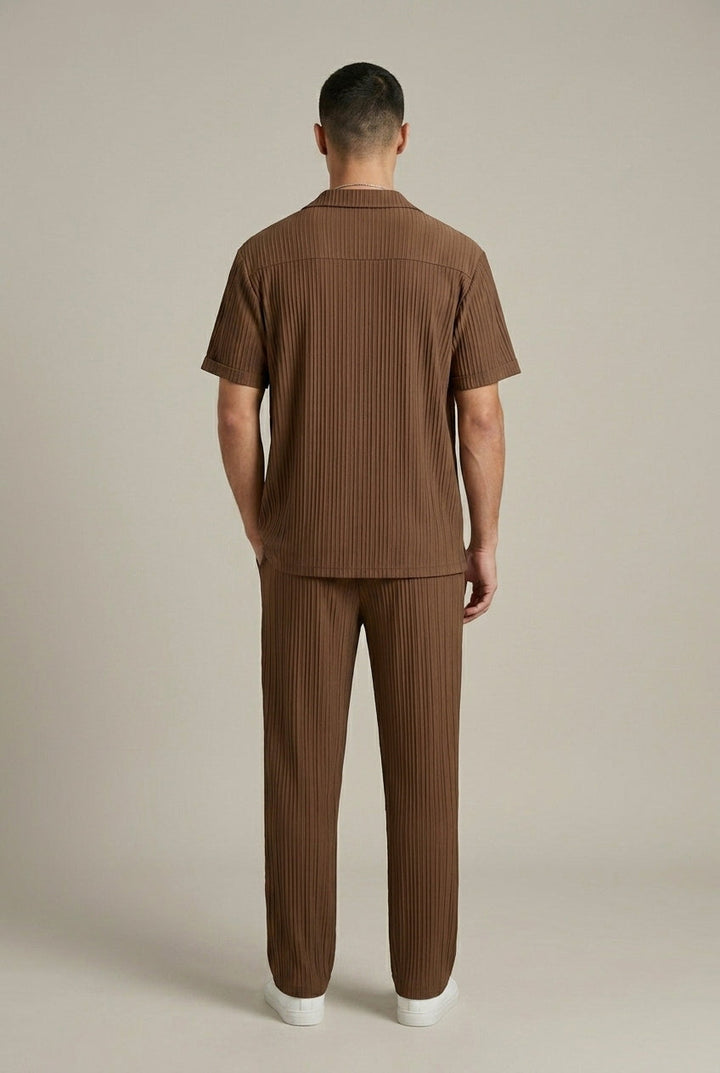 Back view of brown textured stripe shirt and pants set with relaxed fit, casual mens linen suit style