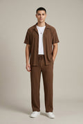 Full-length brown textured stripe shirt and pants set with short sleeves and drawstring waist, casual menswear