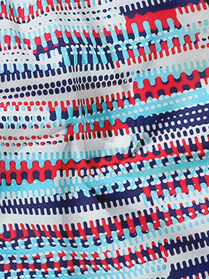 Close-up of men's graphic swim shorts fabric with textured striped pattern in blue, red, white, and navy