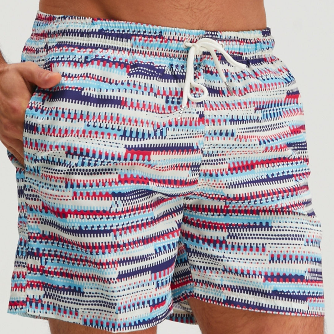 Close-up front view of men's graphic swim shorts showing waistband, drawstring, and bright striped print