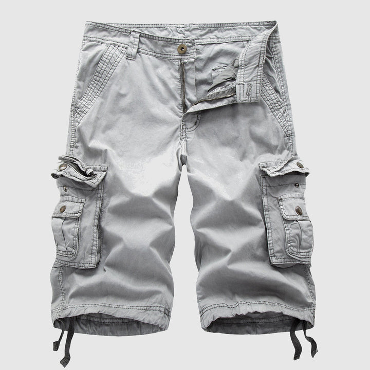 Light gray knee length cargo shorts with multiple pockets, button waist, and rolled hems