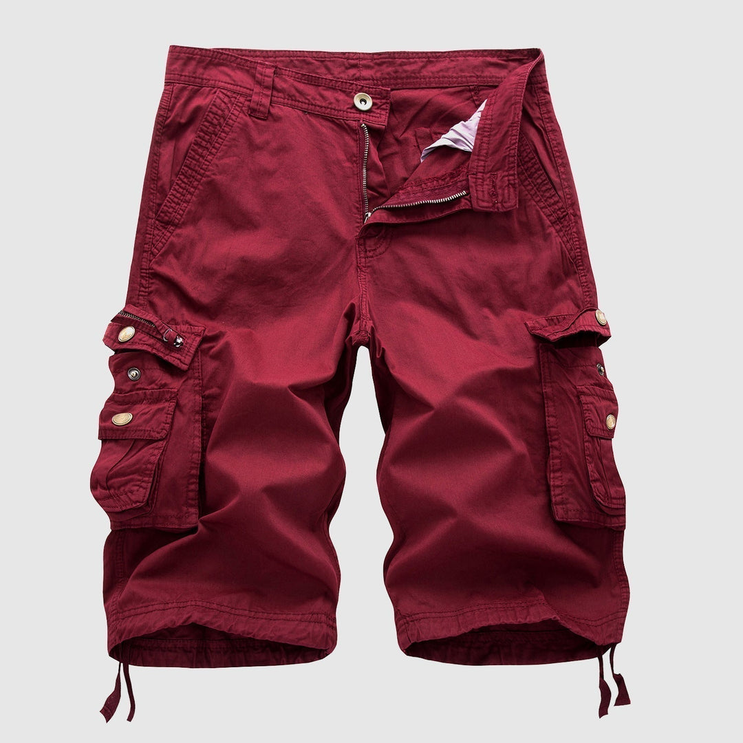 Burgundy knee length cargo shorts with large side pockets, button waist, and drawstring hems