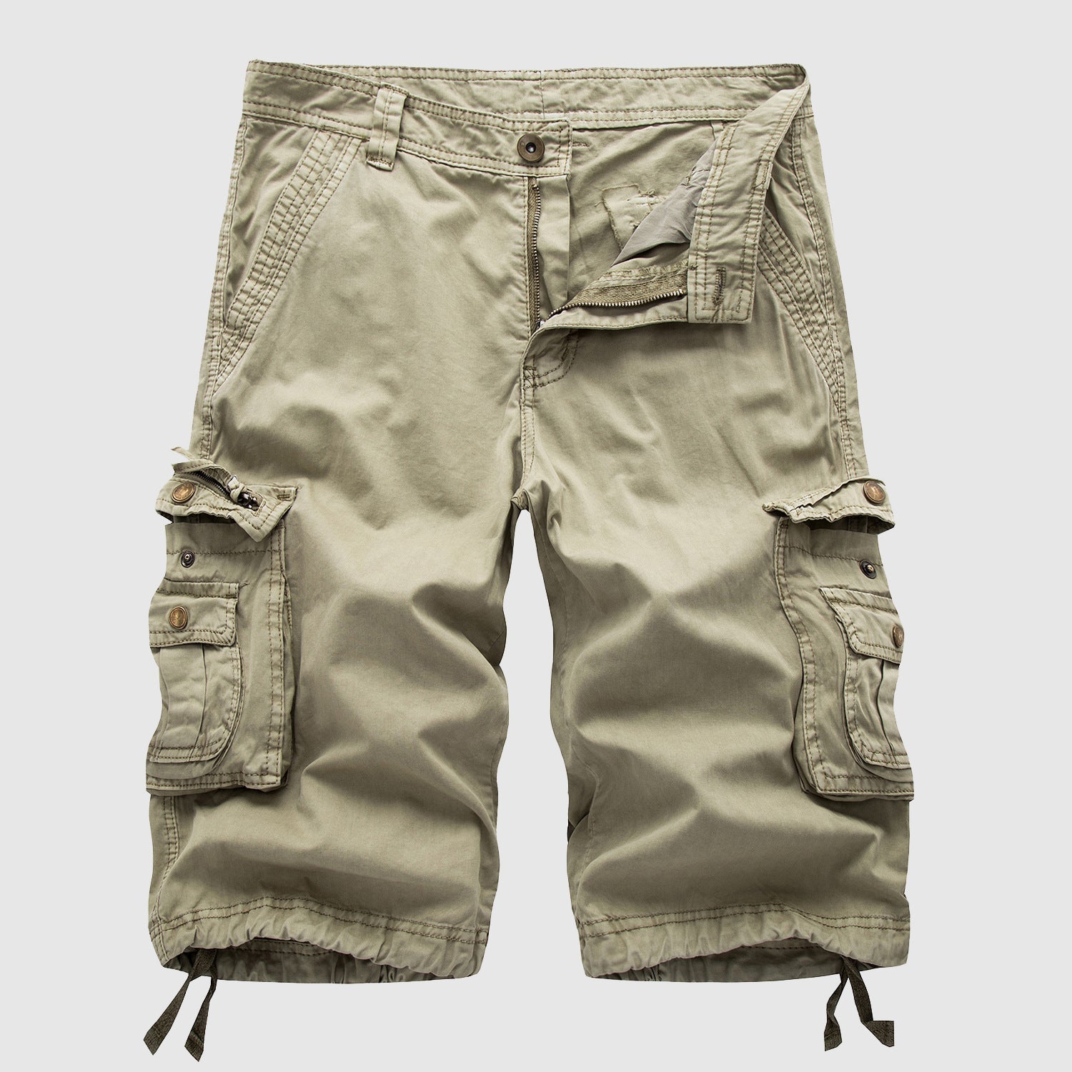 Khaki knee length cargo shorts with side flap pockets, drawstring hems, and front zipper detail