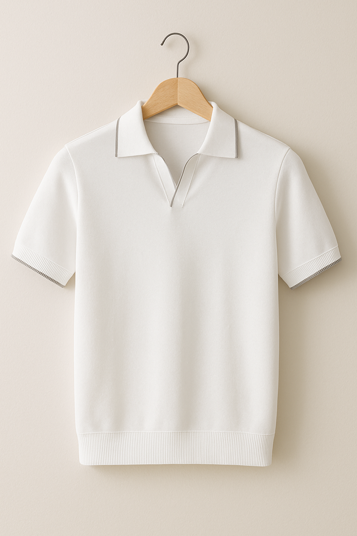 Hanging cream knit polo shirt with subtle contrast trim on collar and sleeves
