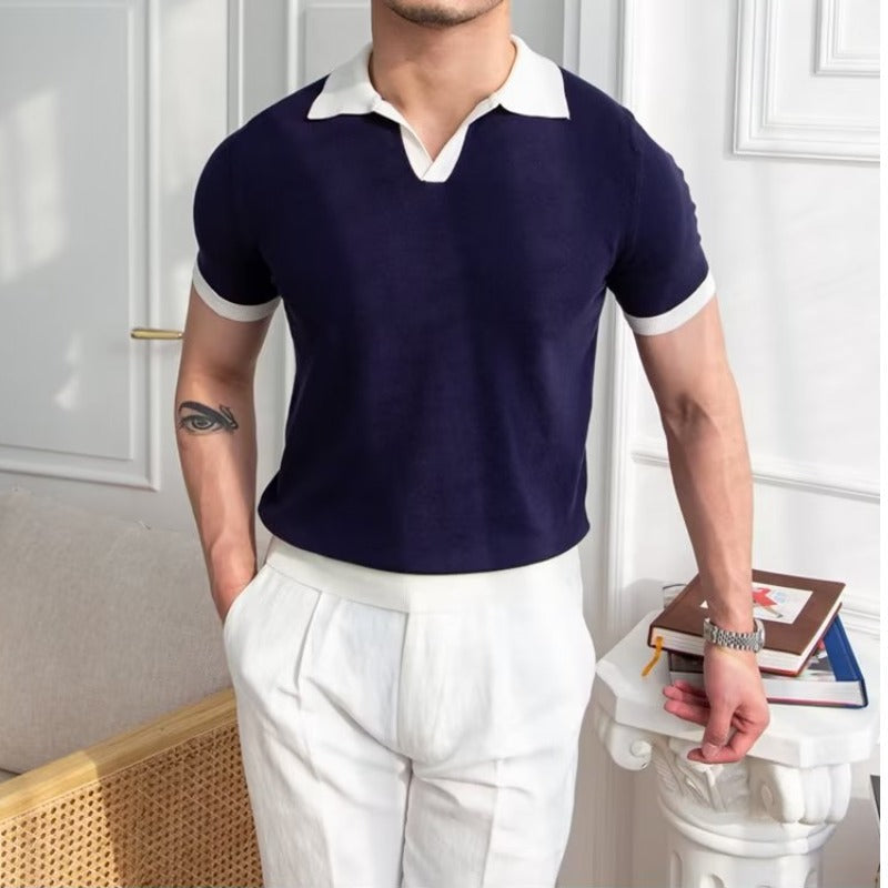 Navy knit polo shirt with white collar and sleeve trim, short sleeve men's shirt