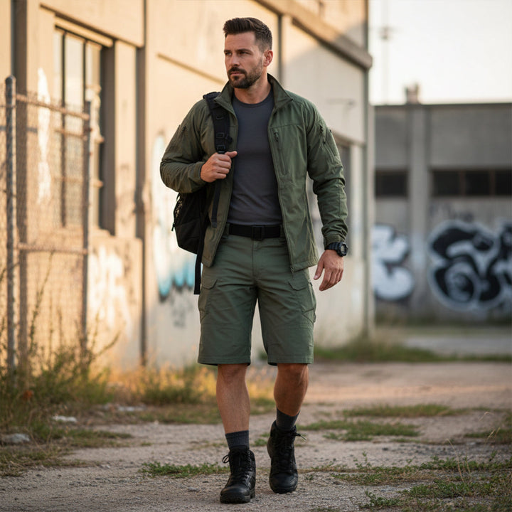 Olive green cargo shorts with flap pockets worn outdoors in an urban setting