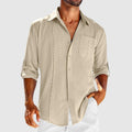 Beige men's linen shirt long sleeve button front with chest pocket and rolled sleeves