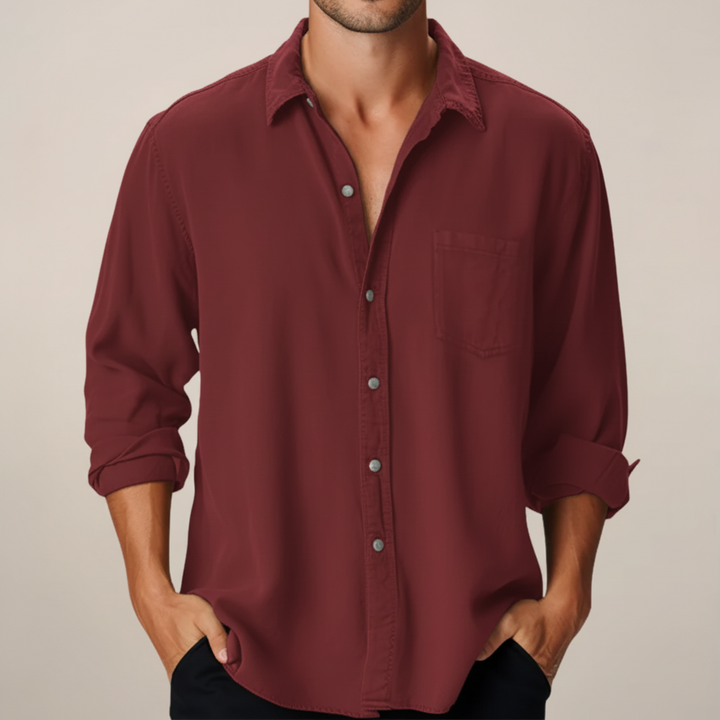 Burgundy men's long sleeve button up shirt with front buttons and chest pocket