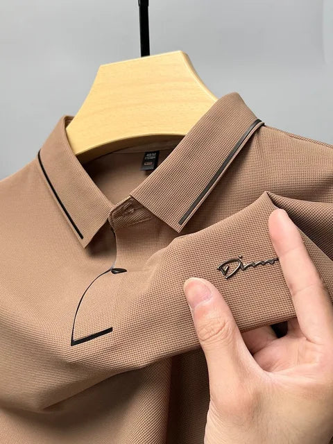 Brown pique knit short sleeve polo shirt with collar and chest logo detail
