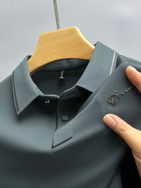Dark gray pique knit short sleeve polo shirt with button placket and collar trim