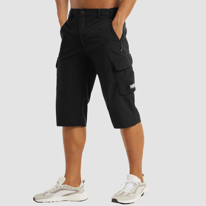 Black men's quick dry cargo shorts front view with zippered pocket and side cargo pocket flap