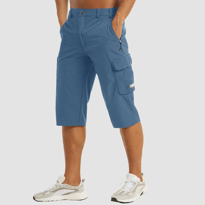 Blue men's quick dry cargo shorts with zipper pocket, belt loops, and flap cargo pocket, front view