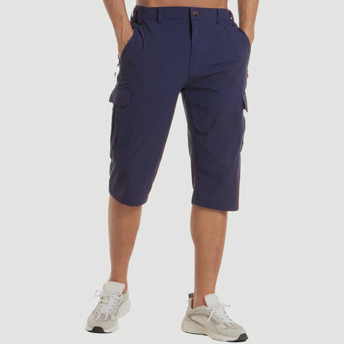Back view of navy quick dry cargo shorts with elastic waist panels and side cargo pockets