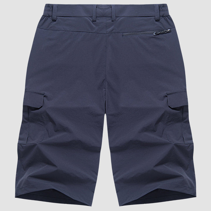 Navy quick dry cargo shorts flat lay back view with zippered back pocket and cargo pockets