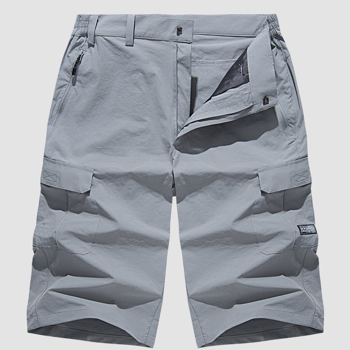 Light gray quick dry cargo shorts flat lay front with open fly, button waist, and cargo pockets