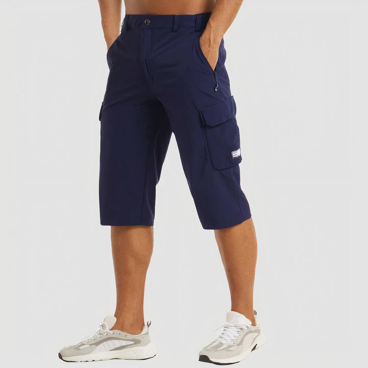 Navy men's quick dry cargo shorts front view with zipper pocket and flap thigh pocket