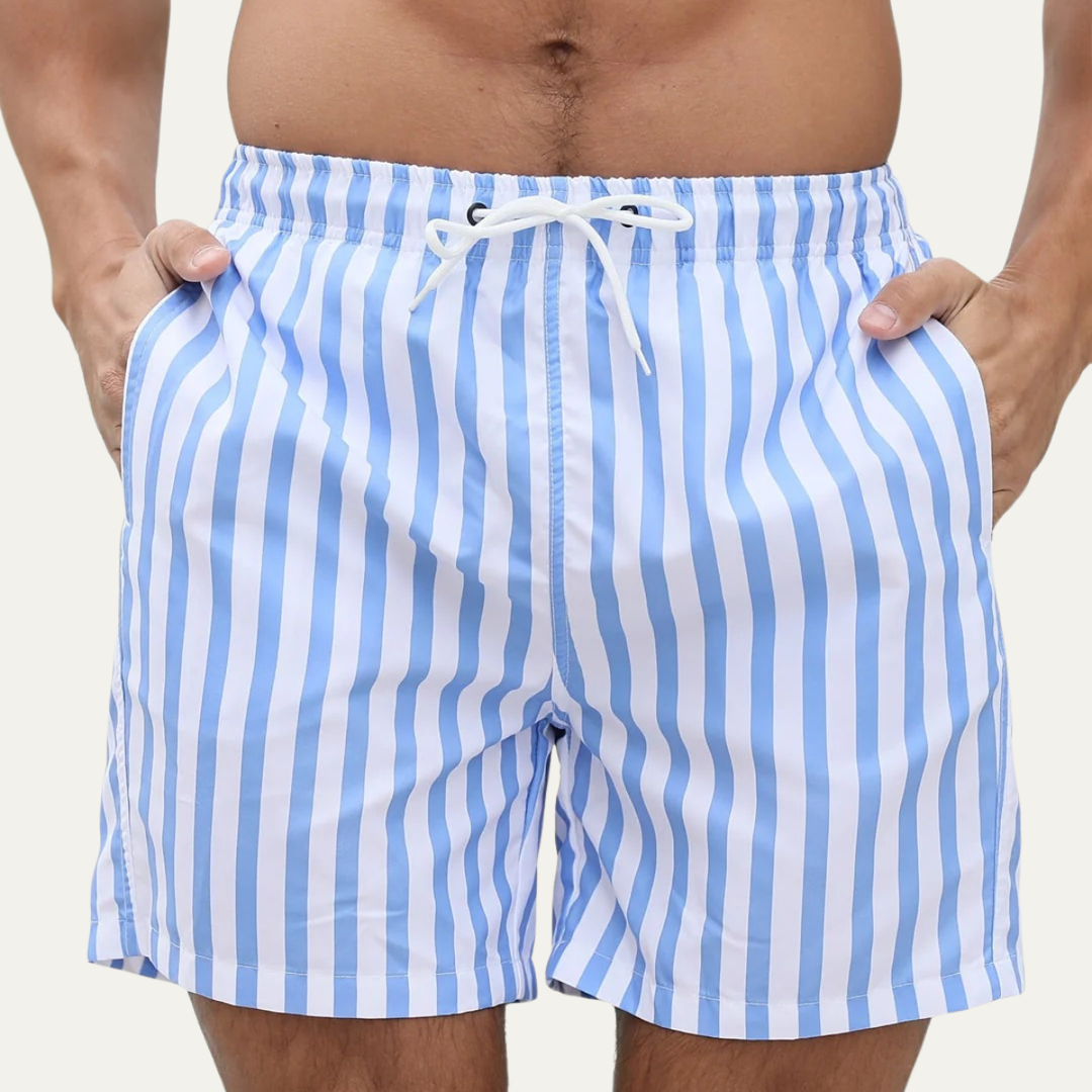 Men's striped swim shorts with white drawstring, front fit view