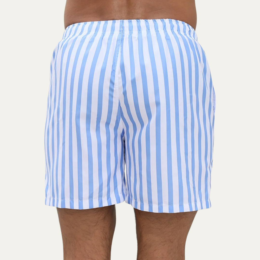 Back view of blue striped bathing suit shorts with elastic waistband