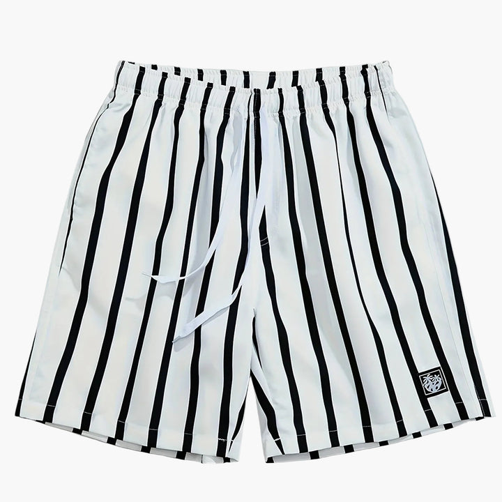 Men's white swim shorts with black vertical stripes, drawstring waist, and logo patch