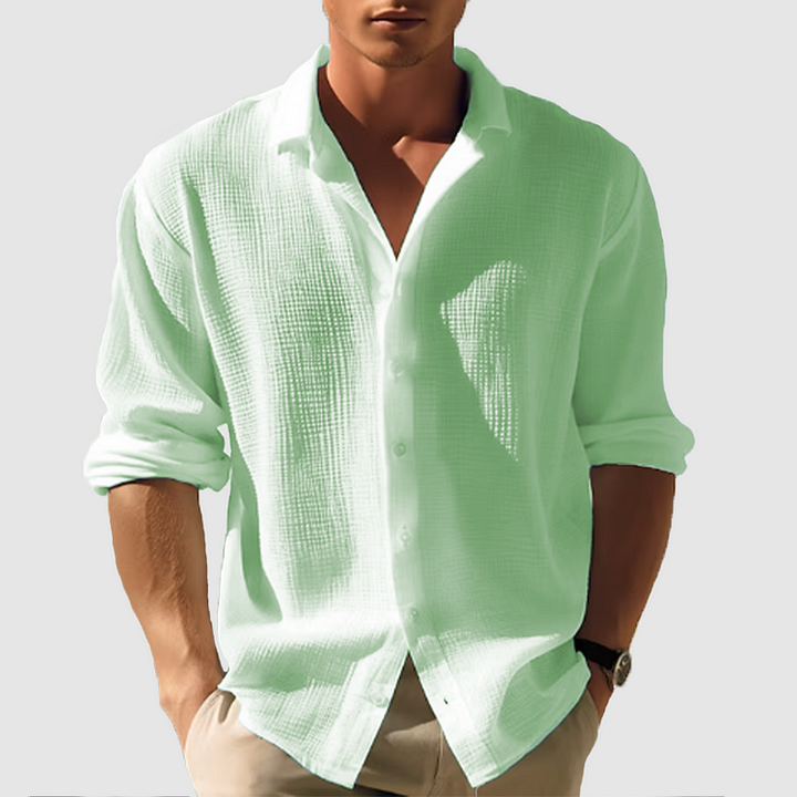 Mint green men's summer button down shirt with long sleeves and airy texture