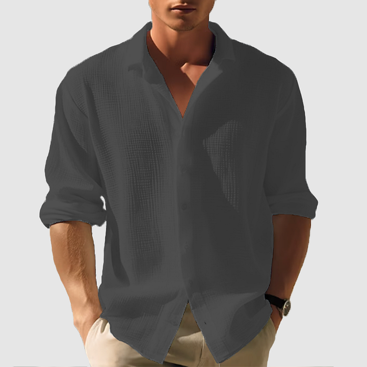 Dark charcoal men's summer button down shirt with long sleeves and rolled cuffs