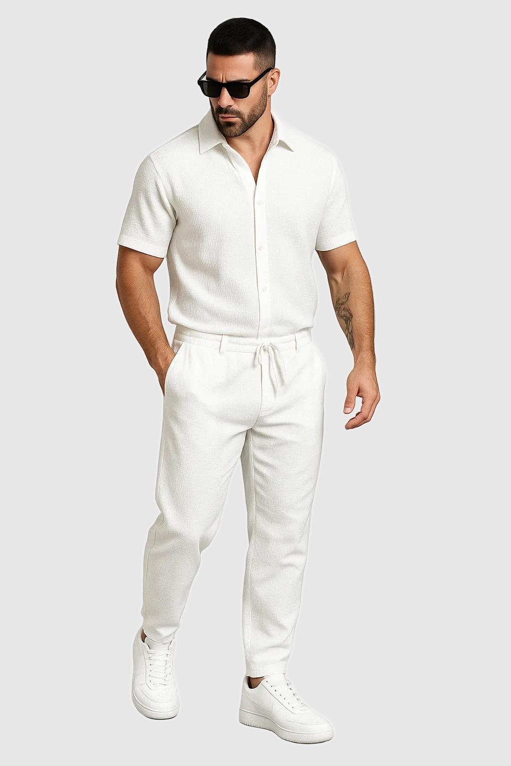 Men's white button front shirt and pants set with short sleeves and drawstring waist