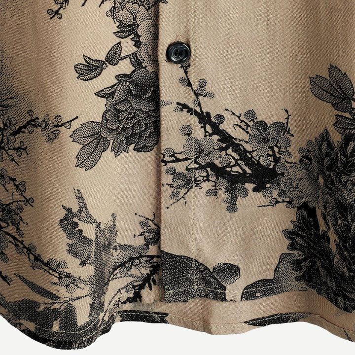 Close-up of shirt buttons and front placket on beige men's floral short sleeve shirt