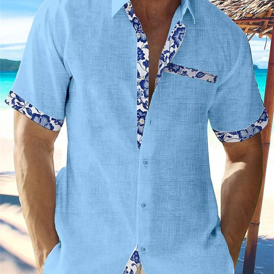 Light blue short sleeve shirt with blue floral trim, relaxed men's summer shirt