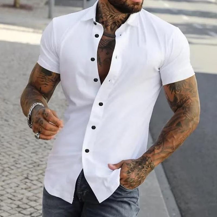 White short sleeve button down shirt with lapel collar shown outdoors on a model