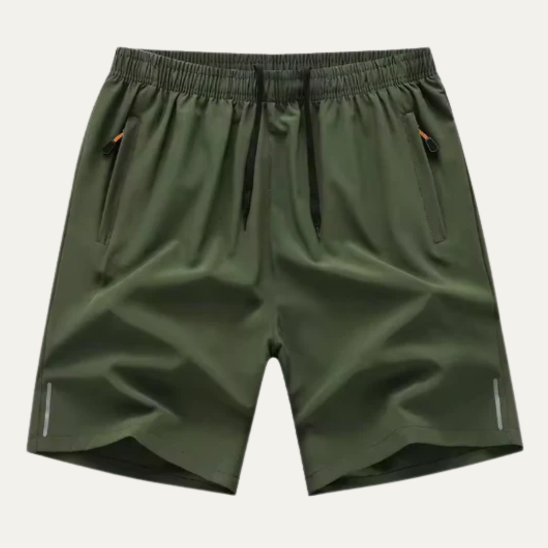 Olive green men's summer running shorts with elastic waist, side pockets, and reflective strips