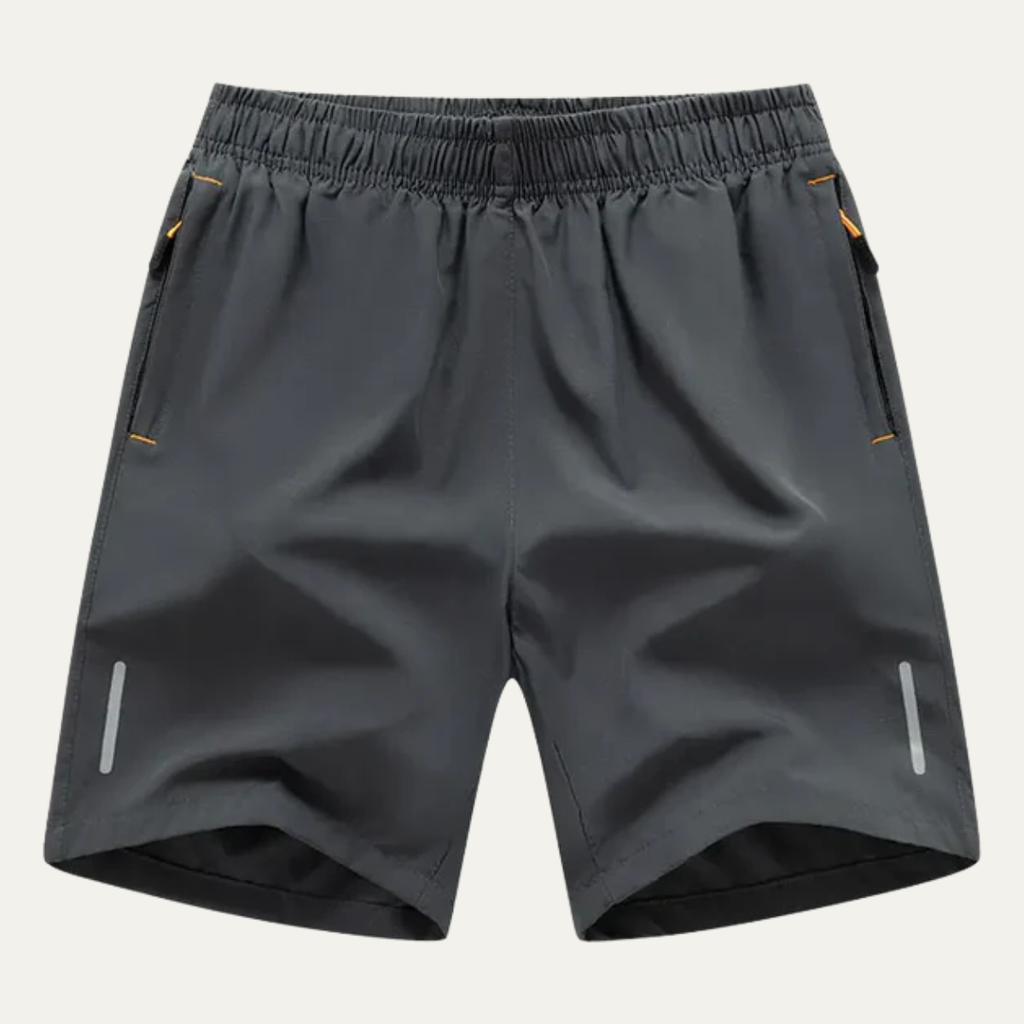 Dark gray men's summer running shorts with elastic waist, zip pockets, and reflective side strips