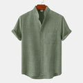 Olive green men's linen shirt with band collar, short sleeves, and chest pocket