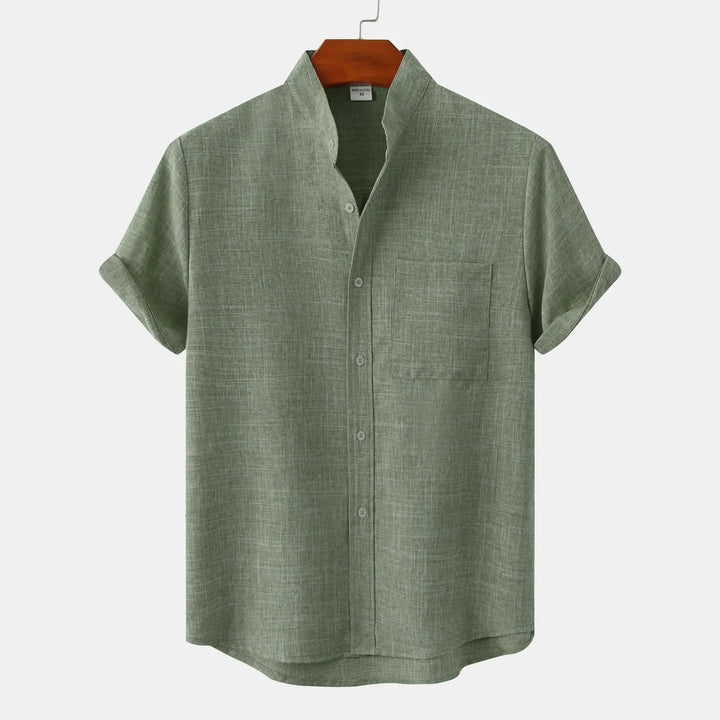 Olive green men's linen shirt with band collar, short sleeves, and chest pocket