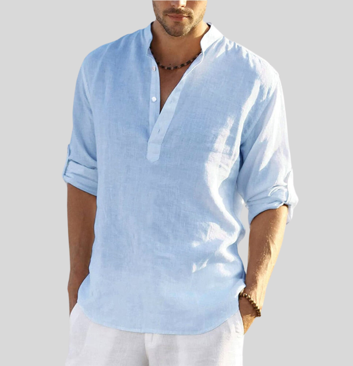 Light blue men's summer linen Henley shirt with rolled sleeves and buttoned neckline