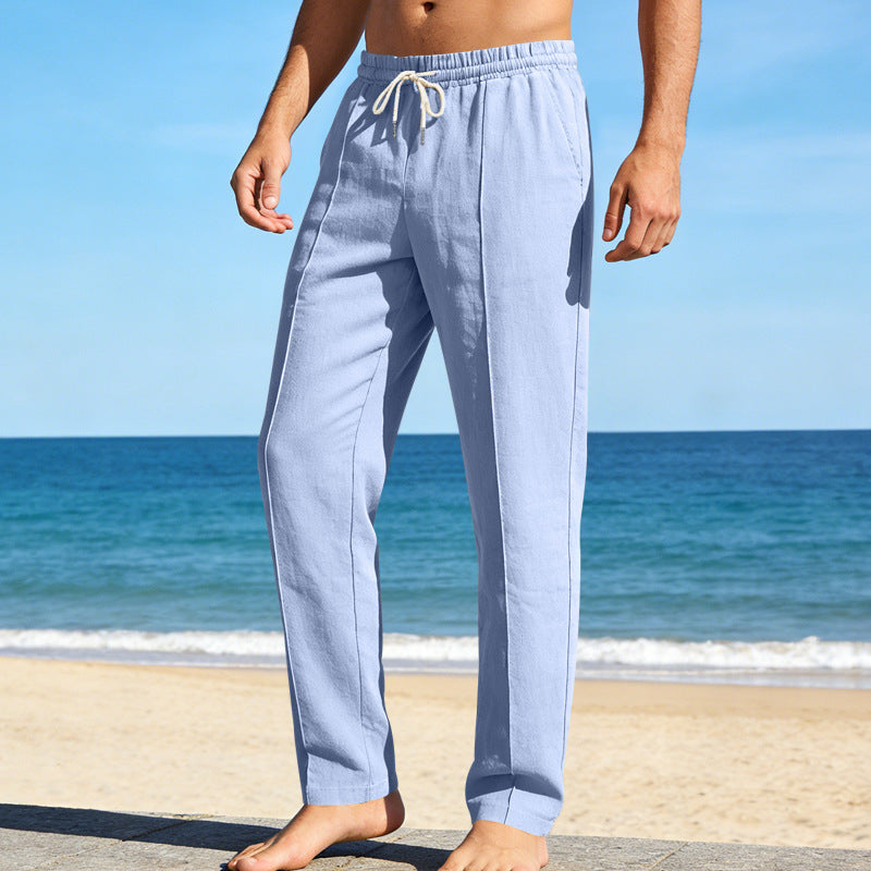 Light blue men's linen pants with drawstring waist and relaxed straight leg fit